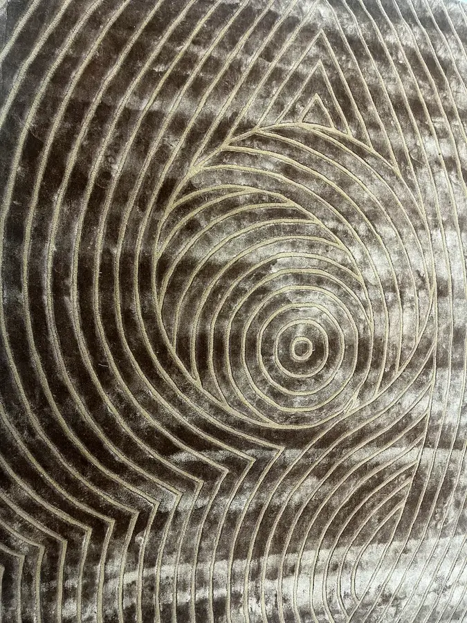 Carved spiral pattern in a taupe colourway